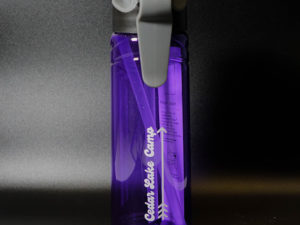 purple water bottle with cedar lake camp text